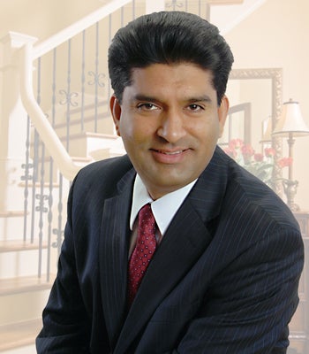 Portrait of Dil Gillani, Licensed Real Estate Broker/Owner.